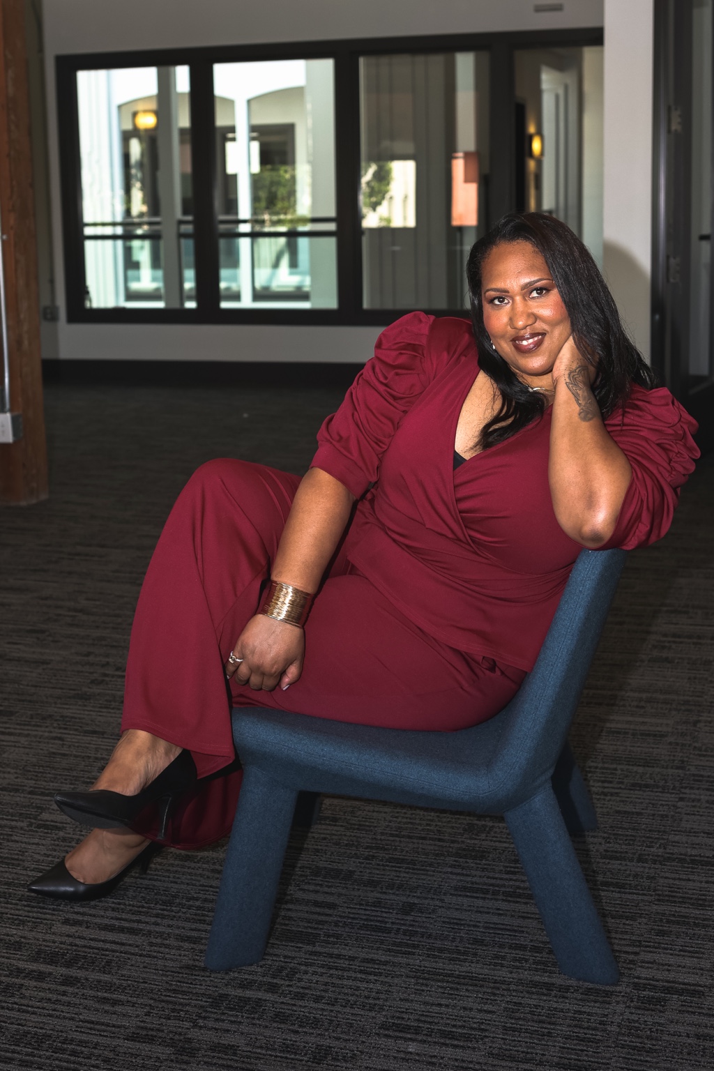 Christina Lane seated with executive presence
